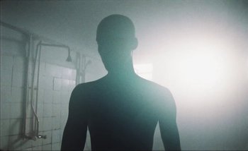 Movie still from “Andrzej Mrozek - Międzysmak” (2019), directed by Łukasz Zabłocki – Medium shot, Low angle