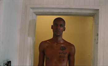 Movie still from “Andrzej Mrozek - Międzysmak” (2019), directed by Łukasz Zabłocki – Medium shot, Low angle