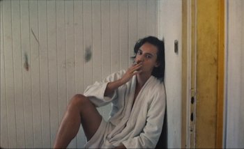 Movie still from “Andrzej Mrozek - Międzysmak” (2019), directed by Łukasz Zabłocki – Medium shot, Low angle