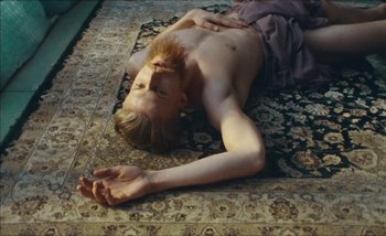 Movie still from “Andrzej Mrozek - Międzysmak” (2019), directed by Łukasz Zabłocki – Medium shot, Overhead angle