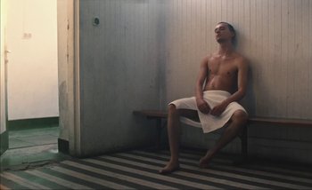 Movie still from “Andrzej Mrozek - Międzysmak” (2019), directed by Łukasz Zabłocki – Medium shot, Low angle