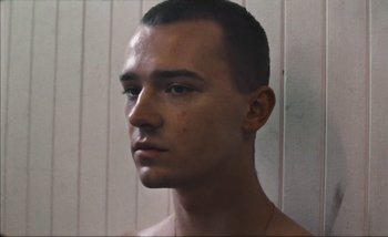 Movie still from “Andrzej Mrozek - Międzysmak” (2019), directed by Łukasz Zabłocki – Close Up shot, Low angle