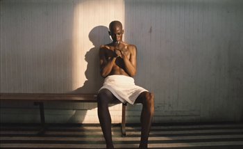 Movie still from “Andrzej Mrozek - Międzysmak” (2019), directed by Łukasz Zabłocki – Medium shot, Low angle