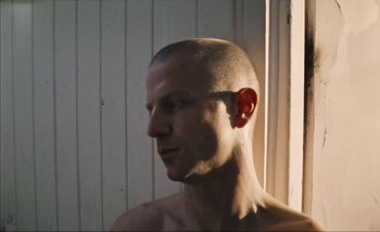 Movie still from “Andrzej Mrozek - Międzysmak” (2019), directed by Łukasz Zabłocki – Close Up shot, Low angle