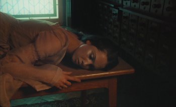 Movie still from “Andrzej Mrozek - Międzysmak” (2019), directed by Łukasz Zabłocki – Medium shot, High angle