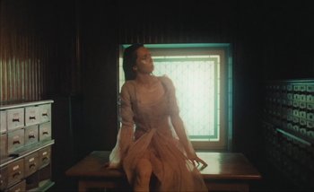 Movie still from “Andrzej Mrozek - Międzysmak” (2019), directed by Łukasz Zabłocki – Medium shot, Low angle