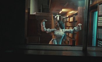 Movie still from “Andrzej Mrozek - Międzysmak” (2019), directed by Łukasz Zabłocki – Medium shot, Low angle