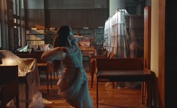 Movie still from “Andrzej Mrozek - Międzysmak” (2019), directed by Łukasz Zabłocki – Wide shot, Low angle