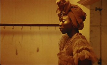 Movie still from “Andrzej Mrozek - Międzysmak” (2019), directed by Łukasz Zabłocki – Medium shot, Low angle