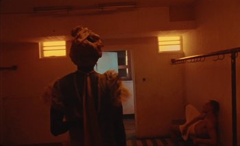 Movie still from “Andrzej Mrozek - Międzysmak” (2019), directed by Łukasz Zabłocki – Medium shot, Low angle