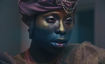 Movie still from “Andrzej Mrozek - Międzysmak” (2019), directed by Łukasz Zabłocki – Close Up shot, Low angle