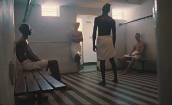 Movie still from “Andrzej Mrozek - Międzysmak” (2019), directed by Łukasz Zabłocki – Wide shot, Low angle