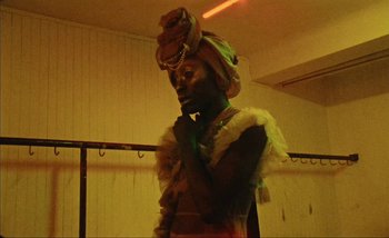 Movie still from “Andrzej Mrozek - Międzysmak” (2019), directed by Łukasz Zabłocki – Close Up shot, Low angle