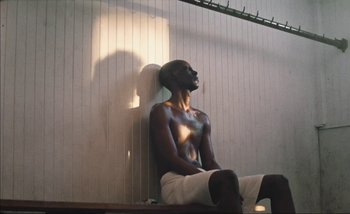 Movie still from “Andrzej Mrozek - Międzysmak” (2019), directed by Łukasz Zabłocki – Medium shot, Low angle