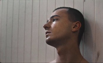 Movie still from “Andrzej Mrozek - Międzysmak” (2019), directed by Łukasz Zabłocki – Close Up shot, Low angle