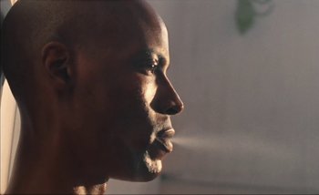 Movie still from “Andrzej Mrozek - Międzysmak” (2019), directed by Łukasz Zabłocki – Close Up shot, Low angle