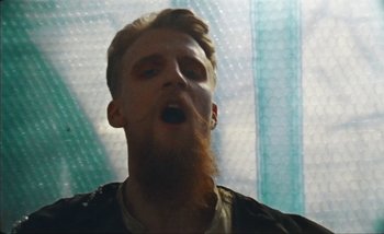 Movie still from “Andrzej Mrozek - Międzysmak” (2019), directed by Łukasz Zabłocki – Close Up shot, Low angle