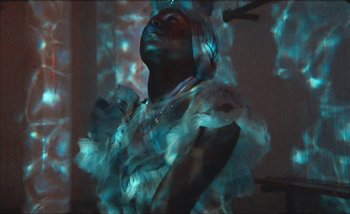 Movie still from “Andrzej Mrozek - Międzysmak” (2019), directed by Łukasz Zabłocki – Medium shot, Low angle