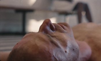 Movie still from “Andrzej Mrozek - Międzysmak” (2019), directed by Łukasz Zabłocki – Extreme Close Up shot, Low angle