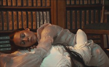 Movie still from “Andrzej Mrozek - Międzysmak” (2019), directed by Łukasz Zabłocki – Medium shot, Overhead angle