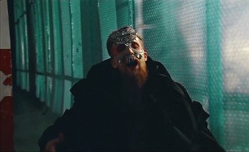 Movie still from “Andrzej Mrozek - Międzysmak” (2019), directed by Łukasz Zabłocki – Medium shot, Low angle