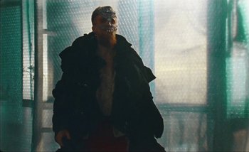 Movie still from “Andrzej Mrozek - Międzysmak” (2019), directed by Łukasz Zabłocki – Medium shot, Low angle