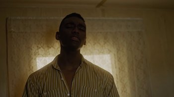 Movie still from “Jordan Hawkins - Lost feat. oghosthaze” (2019), directed by Henry Kinder – Medium shot, Low angle
