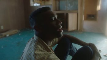 Movie still from “Jordan Hawkins - Lost feat. oghosthaze” (2019), directed by Henry Kinder – Medium shot, Low angle