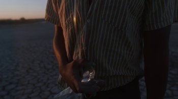 Movie still from “Jordan Hawkins - Lost feat. oghosthaze” (2019), directed by Henry Kinder – Medium shot, Low angle