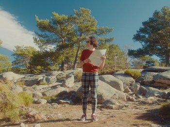 Movie still from “Colectivo Da Silva - Marisol” (2019), directed by Kirkpatrick Buffet – Wide shot, Low angle