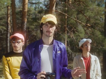 Movie still from “Colectivo Da Silva - Marisol” (2019), directed by Kirkpatrick Buffet – Medium shot, Low angle