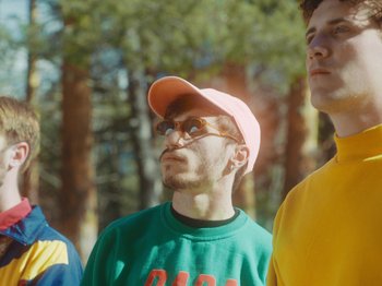 Movie still from “Colectivo Da Silva - Marisol” (2019), directed by Kirkpatrick Buffet – Medium shot, Low angle