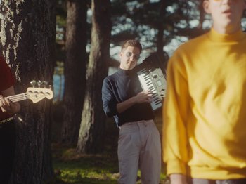 Movie still from “Colectivo Da Silva - Marisol” (2019), directed by Kirkpatrick Buffet – Medium shot, Over the shoulder angle