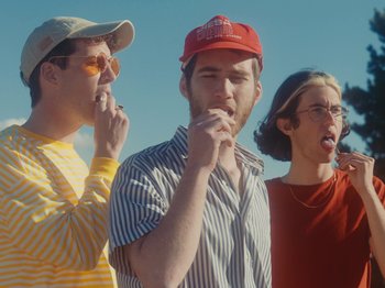 Movie still from “Colectivo Da Silva - Marisol” (2019), directed by Kirkpatrick Buffet – Medium shot, Low angle