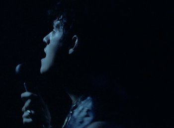 Movie still from “Omar Apollo - So Good” (2019), directed by Kevin Lombardo – Close Up shot, Low angle