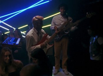 Movie still from “Omar Apollo - So Good” (2019), directed by Kevin Lombardo – Medium shot, Low angle
