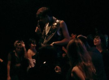 Movie still from “Omar Apollo - So Good” (2019), directed by Kevin Lombardo – Medium shot, Low angle