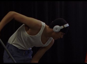 Movie still from “Omar Apollo - So Good” (2019), directed by Kevin Lombardo – Medium shot, Low angle
