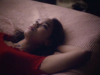 Movie still from “G FLIP - I Am Not Afraid” (2019), directed by Lucy Knox – Close Up shot, High angle