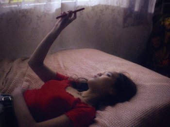 Movie still from “G FLIP - I Am Not Afraid” (2019), directed by Lucy Knox – Medium shot, Overhead angle