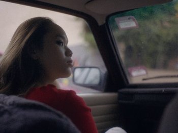 Movie still from “G FLIP - I Am Not Afraid” (2019), directed by Lucy Knox – Close Up shot, Low angle