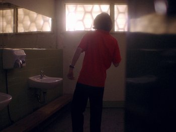 Movie still from “G FLIP - I Am Not Afraid” (2019), directed by Lucy Knox – Medium shot, Low angle