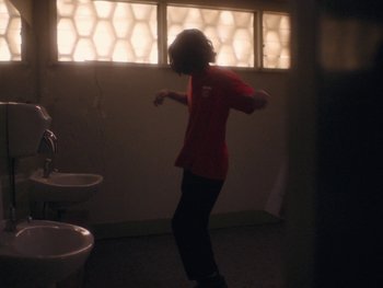 Movie still from “G FLIP - I Am Not Afraid” (2019), directed by Lucy Knox – Medium shot, High angle