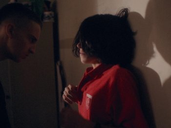 Movie still from “G FLIP - I Am Not Afraid” (2019), directed by Lucy Knox – Medium shot, Over the shoulder angle