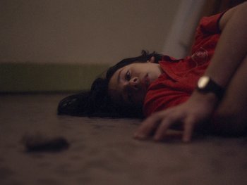 Movie still from “G FLIP - I Am Not Afraid” (2019), directed by Lucy Knox – Extreme Close Up shot, High angle