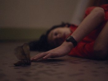 Movie still from “G FLIP - I Am Not Afraid” (2019), directed by Lucy Knox – Extreme Close Up shot, Overhead angle