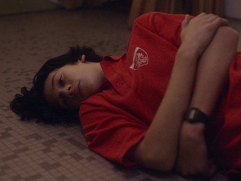 Movie still from “G FLIP - I Am Not Afraid” (2019), directed by Lucy Knox – Medium shot, Overhead angle