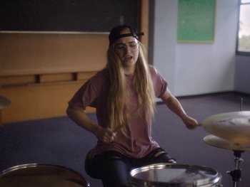 Movie still from “G FLIP - I Am Not Afraid” (2019), directed by Lucy Knox – Medium shot, High angle