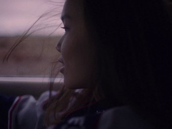 Movie still from “G FLIP - I Am Not Afraid” (2019), directed by Lucy Knox – Close Up shot, Low angle