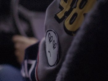 Movie still from “G FLIP - I Am Not Afraid” (2019), directed by Lucy Knox – Extreme Close Up shot, Over the shoulder angle